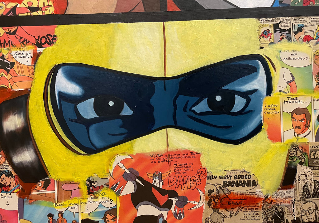 Détail du tableau avec deux regards contrastés, combinant peinture et collage de comics anciens.